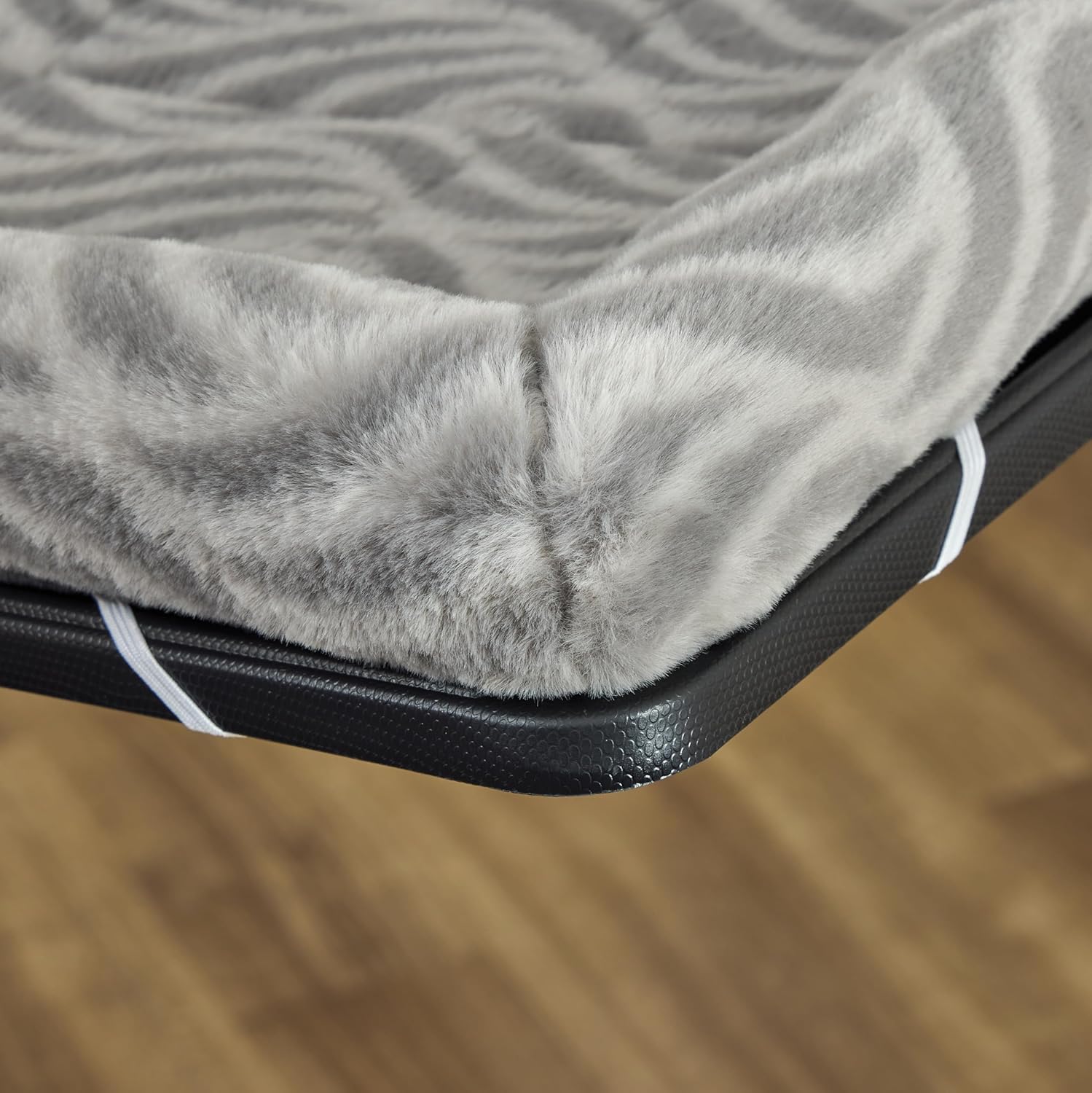 Folded Wave Grey dog bed on clean surface