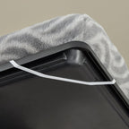 Folded gray dog bed showing compact storage